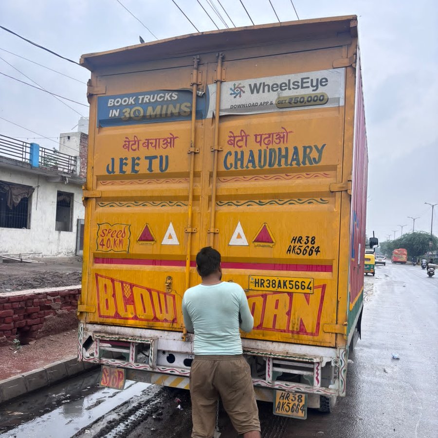 Sealed consignment truck being secured before departure