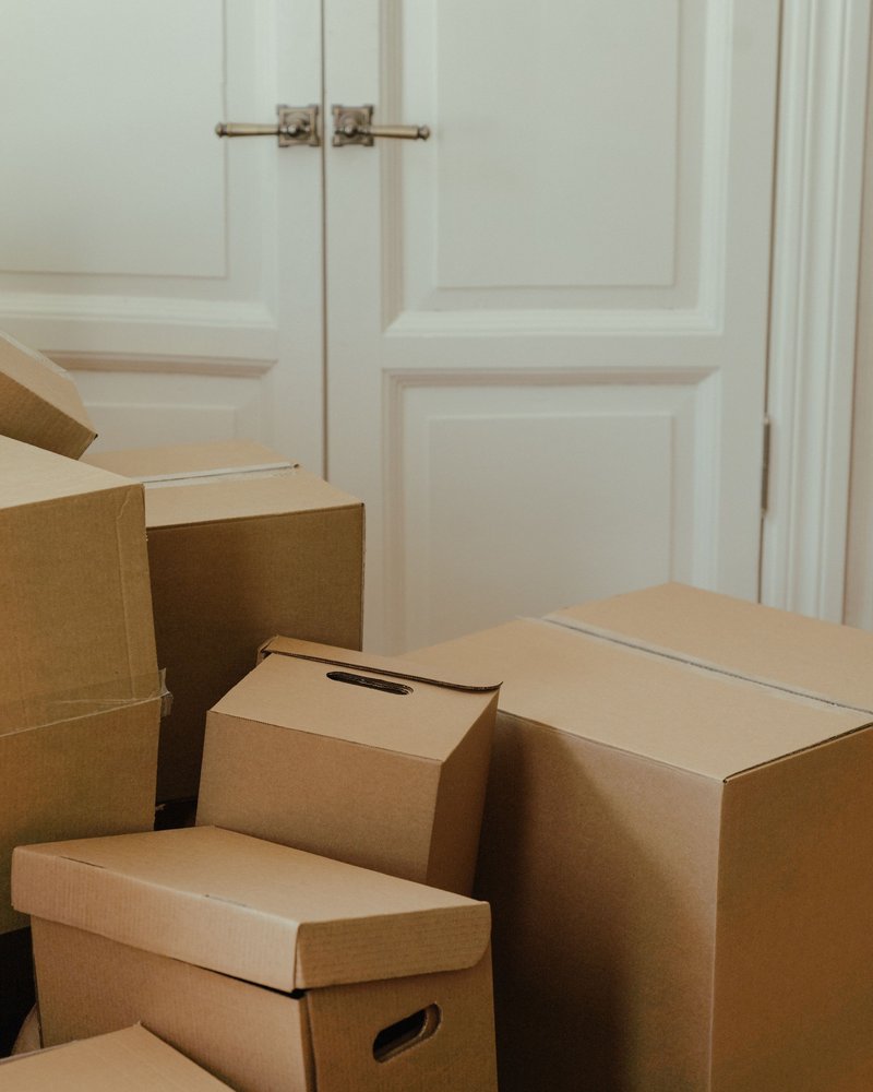 Packed cartons stacked and ready in a home