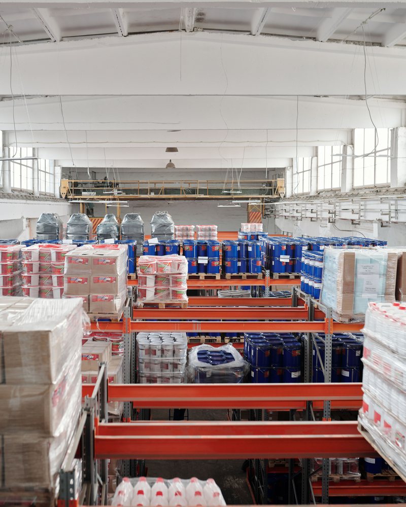 Palletised goods on racking inside a storage warehouse